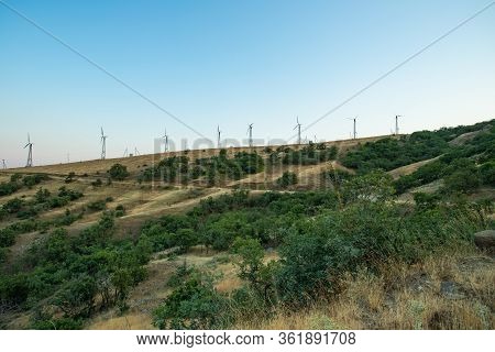 Wind Farms On Cape Meganom In Summer Outdoors In Crimea, Russia.