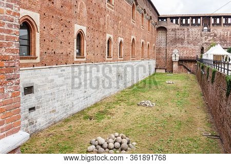 Milan, Italy, 29 September, 2015 : Fortress Moat With Piles Of Stone Cores In Front Of The Fortress 