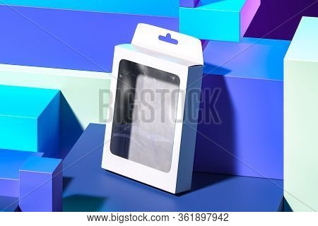 Blank White Cardboard Box On Blue Abstract Background With Rectangular And Foursquare Figures. 3d Re