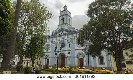 Cayambe, Pichincha / Ecuador - February 24 2020: People Walking In Front Of The Cayambe Matriz Churc