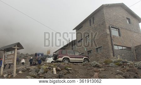 Cayambe, Pichincha / Ecuador - February 24 2020: Group Of Tourists Walking Near The Ruales Oleas Ber
