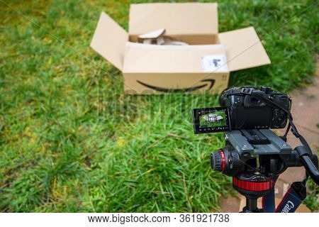 Paris, France - Feb 23, 2020: Vlogger Setup For Unboxing Process From Amazon Prime E-commerce Retail