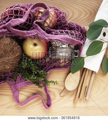 Net Bag With Reusable  Glass Jars, Fruits And Bamboo Cutlery. Zero Waste Concept. Eco Friendly. Flat