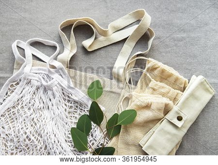 Net Bag With Reusable  Glass Jars, Fruits And Bamboo Cutlery. Zero Waste Concept. Eco Friendly. Flat