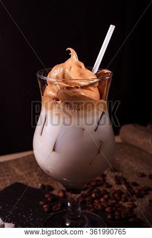 Iced Korean Dalgona Coffee, Trendy Fluffy Creamy Whipped Coffee With A White Tube And Ice. Trendy Co