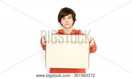 Cfood Delivery. A Man In Holds A Box. Isolate Copy