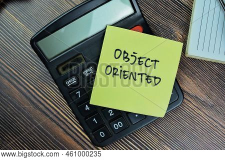 Concept Of Object Oreiented Write On Sticky Notes Isolated On Wooden Table.