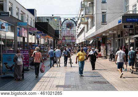 Almere, Flevoland, The Netherlands, 07 20 2022 - People Of All Ages Walking In The Shopping Streets 