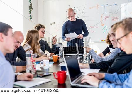 Startup Business And Entrepreneurship Problem Solving. Young Ai Programmers And It Software Develope