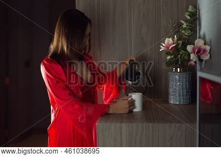 Pour Hot Water Glass Tea, Woman Making Morning Tea To Have With Breakfast At Home, A Girl In A Satin