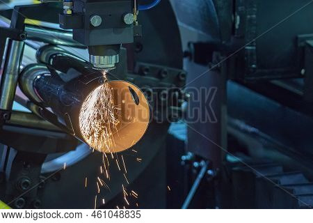 The Fiber Laser Cutting Machine Cutting  Machine Cut The Stainless Steel Tube. The Hi-technology She