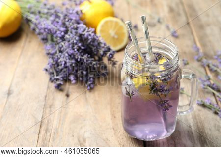 Fresh Delicious Lemonade With Lavender In Masson Jar On Wooden Table. Space For Text