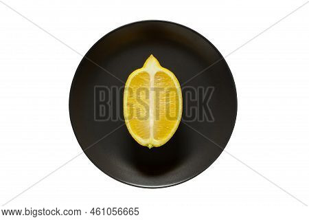 Lemon Cut Lengthwise, On Gray Plate, Isolated On White Background With Clipping Path, Top View.
