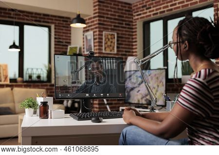 Freelancer Talking With Client On Videoconference, Woman Working From Home. Employee Attending Virtu