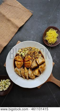 Pempek Or Empek-empek Or Fish Cake Is A Food Made From Soft Ground Fish Meat Mixed With Tapioca Flou