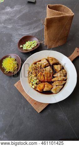 Pempek Or Empek-empek Or Fish Cake Is A Food Made From Soft Ground Fish Meat Mixed With Tapioca Flou