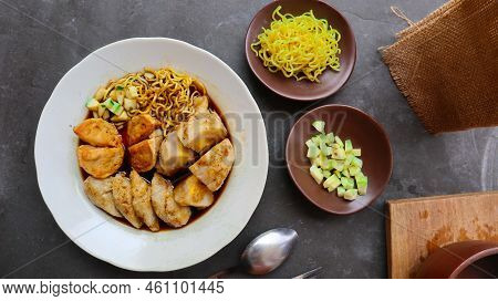 Pempek Or Empek-empek Or Fish Cake Is A Food Made From Soft Ground Fish Meat Mixed With Tapioca Flou