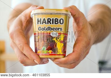 Pskov, Rusia - August 09, 2022: A Man Keeps Up To Date With A Pack Of Haribo Chewing Beers.
