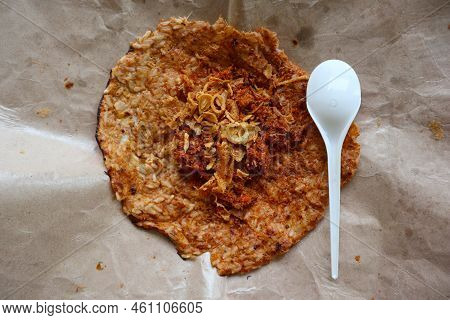 Kerak Telor Or Egg Crust. Kerak Telor Is Spicy Glutinous Rice Omelette With Grated Coconut. Made Fro