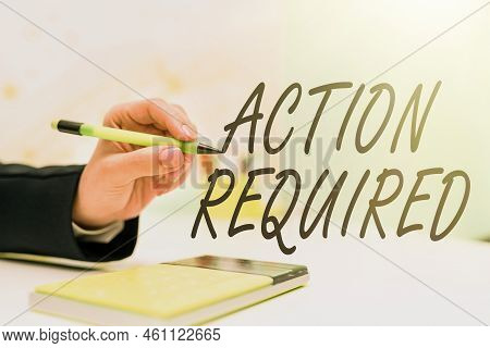Hand Writing Sign Action Requiredregard An Action From Someone By Virtue Of Their Position. Concept 