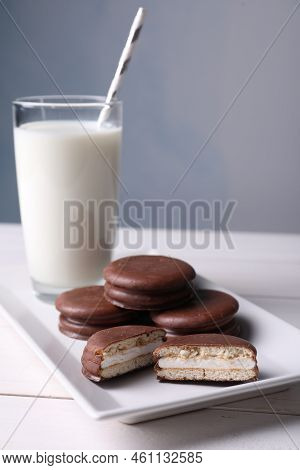Tasty Choco Pies And Milk On White Wooden Table