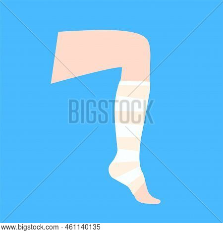 Elastic Bandage On Human Leg. Roll And Wrap Medical Gauze Over A Foot. Broken Or Injured Ankle. Heal