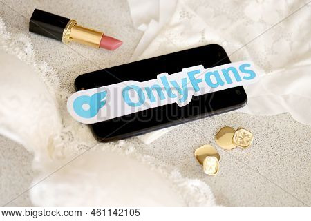 Ternopil, Ukraine - September 6, 2022 Onlyfans Paper Logotype Among Lipstick, Earrings And Women Lin