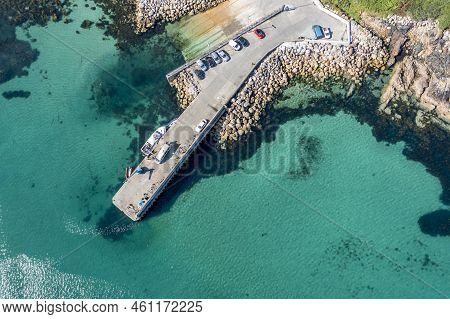 Aerial View Of The Pier At Leabgarrow On Arranmore Island In County Donegal, Republic Of Ireland