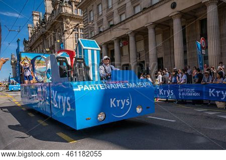 Lausanne, Vaud Canton, Switzerland -09 July, 2022: Passage Of An Advertising Car Of Krys Audition Gr