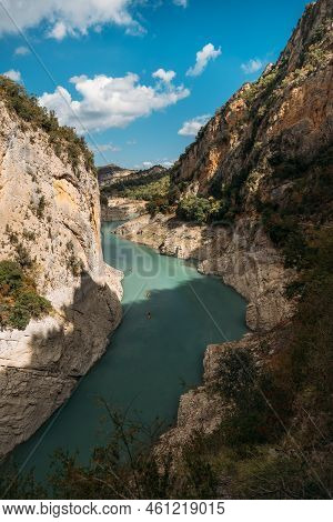 Aerial View Of The Congost De Mont-rebei Gorge And Kayakers On Sunny Day In Catalonia, Spain
