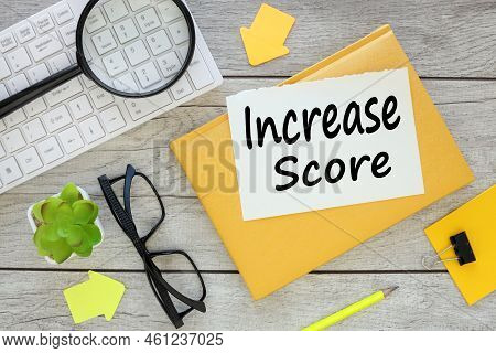 Business Concept. Stationery White Keyboard. Text On Notepad. Increase Score