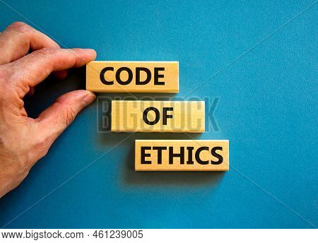 Code Of Ethics Symbol. Concept Words Code Of Ethics On Wooden Blocks On A Beautiful Blue Table Blue 