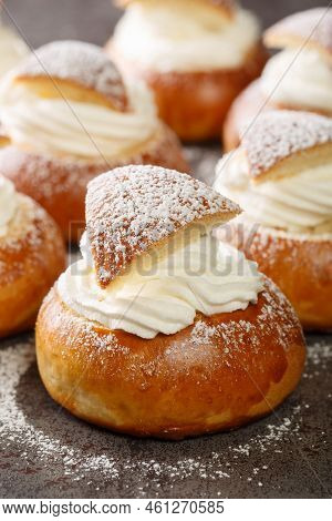 Traditional Winter Sweet Semla Semlor Or Fastlagsbulle Flavored With Cardamom, Filled With Almond Pa