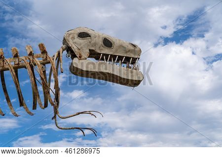 Glendive, Montana - July 22, 2022: Welcome To Glendive Sign Features A Dinosaur Skeleton, As The Tow