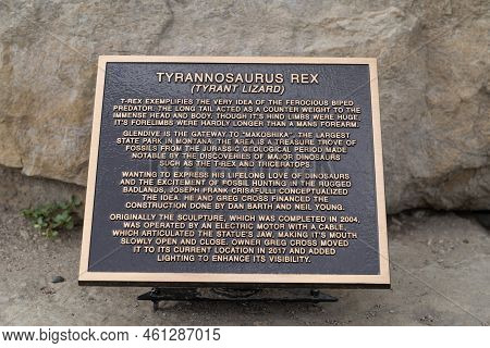 Glendive, Montana - July 22, 2022: Plaque Explaining The T-rex Statue And Sculpture At The Welcome T