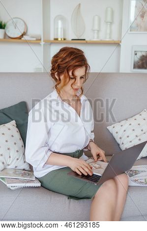 Tver, Russia-july 31, 2022 A Woman With A Laptop Is Studying Human Design. The Concept Of Studying E