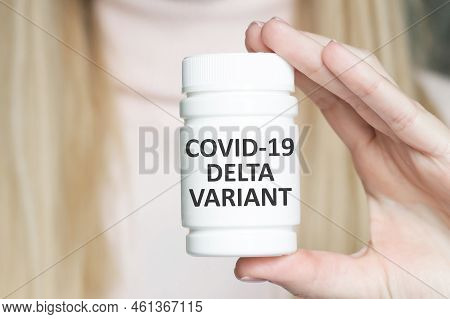 Technician Holding Tube Of Blood Test Identified With The Label Covid-19 Delta Variant. Doctor With 