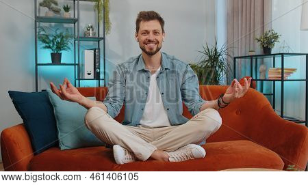 Keep Calm Down, Relax, Inner Balance. Adult Man Breathes Deeply With Mudra Gesture, Eyes Closed Medi