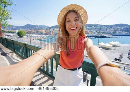 Joyful Traveler Girl Takes Self Portrait In Nice Old Port, France