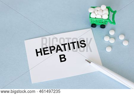 A Card With Text Hepatitis B On A Table With A Pills And Pencil, Medical Concept, Top View