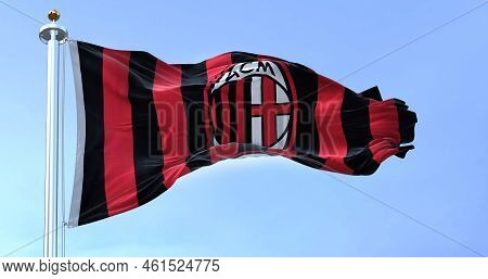 Milan, Italy, July 2022: The Flag Of A.c. Milan Waving In The Wind On A Clear Day. Milan Is A Profes