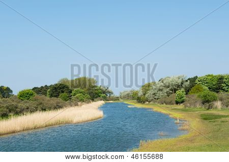 Voda v holandské Amsterdamse waterleiding dun