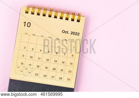 October 2022 Monthly Desk Calendar For 2022 Year Made From Craft Paper On Beautiful Background.
