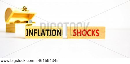 Inflation Shocks Symbol. Concept Words Inflation Shocks On Wooden Blocks. Beautiful White Table Whit