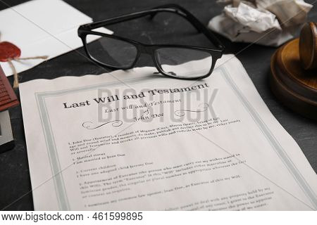 Last Will And Testament Near Glasses On Black Table, Closeup