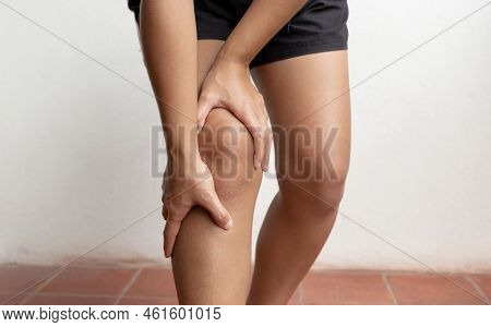 Woman Hand Massage Physiotherapy Her Knee Is Sore And Numb, Exhausted, Tingling. Guillain-barre Synd