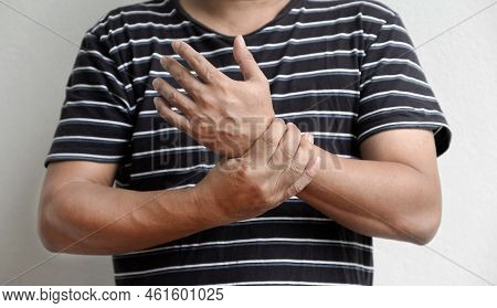 Man Hand Massage Physiotherapy Wrist Is Sore And Numb, Exhausted, Tingling. Guillain-barre Syndrome,