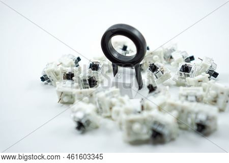 Conceptual Keycap Puller With Mechanical Keyboard Keycaps And Black Mechanical Switch Keys Isolated 