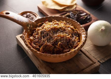 Tinga De Res. Typical Mexican Dish Prepared Mainly With Shredded Beef, Onion And Dried Chilies. It I