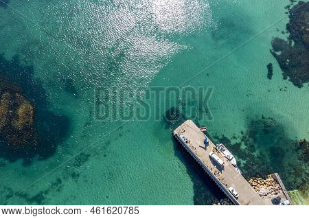 Aerial View Of The Pier At Leabgarrow On Arranmore Island In County Donegal, Republic Of Ireland